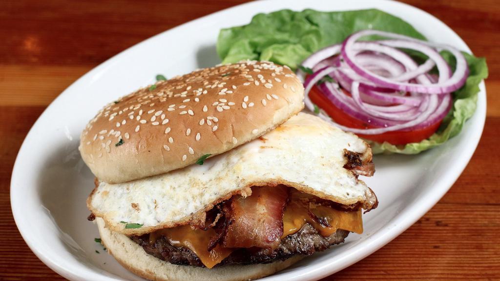 Nugget Burger · Cheeseburger, bacon, and a fried egg.