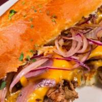 Philly Cheese Steak · Slow roasted steak, grilled onions, and melted cheese. Add your favorite toppings