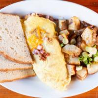 Build Your Own Omelet · Three large eggs with your choice of cheese, mushrooms, ham, bacon, sour cream, avocado or s...
