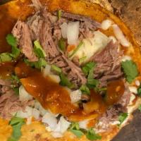 NEW! Quesibirria · Taco style corn tortilla filled with jack cheese and choice of meat topped with onions, cila...