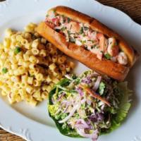 Maine Lobster Roll · chilled steamed lobster, tarragon aioli, toasted challah bun, cabbage slaw, and choice of ad...