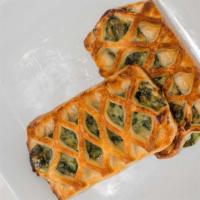 Spinach Croissant · The perfect mix of creamy spinach and feta cheese stuffed in a croissant.