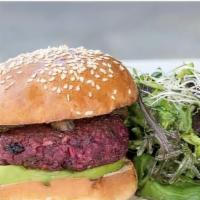 NOTORIOUS IVB BURGER · house-made beet burger patty, curried mushrooms, salad greens, alfalfa sprouts, avocado, sta...