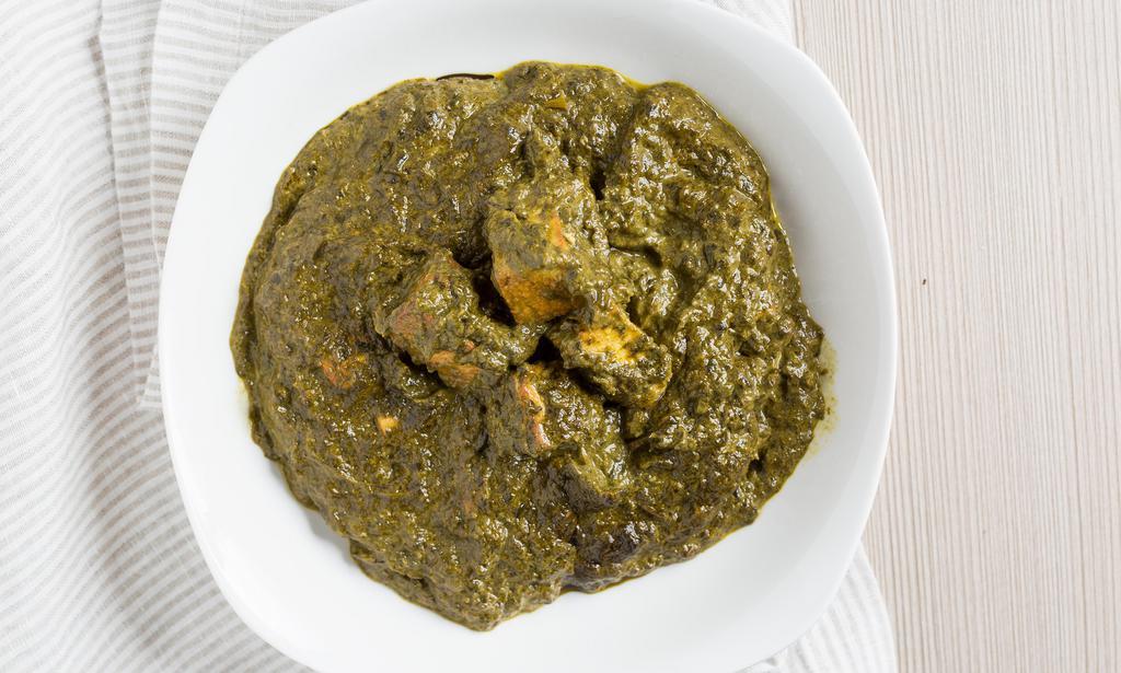 Saag Paneer/Aloo · Pureed spinach leaves cooked with Potatoes / Paneer .
