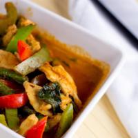 C5. Panang Curry · Basil, green beans, coconut milk, and bell peppers in our thick panang curry.