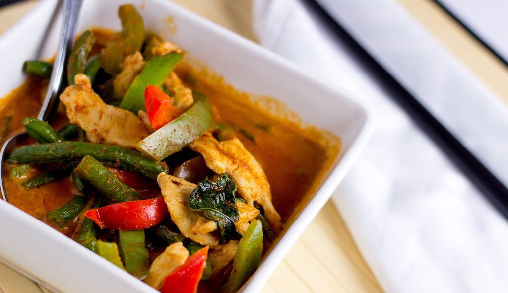 Panang Curry · Spicy. String bean and bell pepper in coconut milk with panang paste.