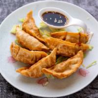 Potstickers · Chicken potstickers served with home made dipping sauce.