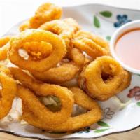 Calamari · Deep fried calamari rings served w/ sweet sour sauce.