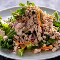 Larb Salad · Medium.Ground meat with fresh mint leaves, red onions, carrots, lime juice with roasted rice...