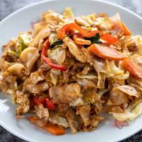 Pad Kee Mao · Medium.Flat rice noodles stir fried with egg, cabbages, carrots, Thai basil and chili.