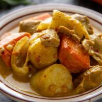Yellow Curry · Yellow curry with coconut milk, potatoes, carrots, and onions.