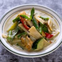 Green Curry · Spicy fresh green chili, coconut milk, green beans, bamboo shoots, red bell and Thai basil.
