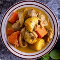 Mussamun Curry · Mixture of red and yellow curry, potatoes, onions, fresh ginger and peanuts combined with he...