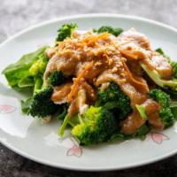 Param · Thai Peanut curry sauce sautéed with choice of protein over steamed broccoli and spinach top...