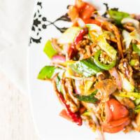 Hunan Lamb · Tender marinated lamb sauteed w/ fresh leeks, red onion, red bell pepper, and jalapenos w / ...
