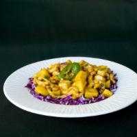 Mango Beef or Chicken · Fresh diced mango and jalapenos sauteed w/ beef or chicken with finely chopped cilantro, red...