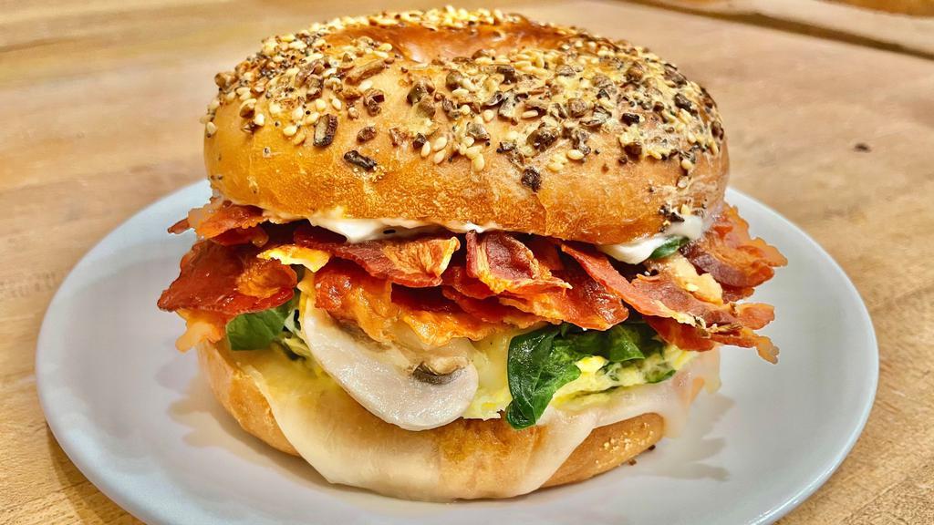 Bagel with Mayo, Egg, Mozzarella, Spinach, Mushroom & Bacon · If the bagels of your choice are not available, you will receive a plain bagel.