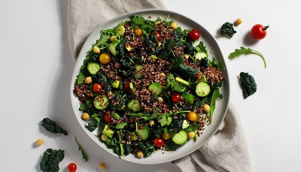 Quinoa Salad · Avocado, chickpeas, quinoa, kale, tomato, and cucumber with your choice of greens and dressing.