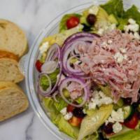 Greek Salad · Chopped romaine, ham, cucumbers, tomatoes, artichoke hearts, kalamata olives, red onions, fe...