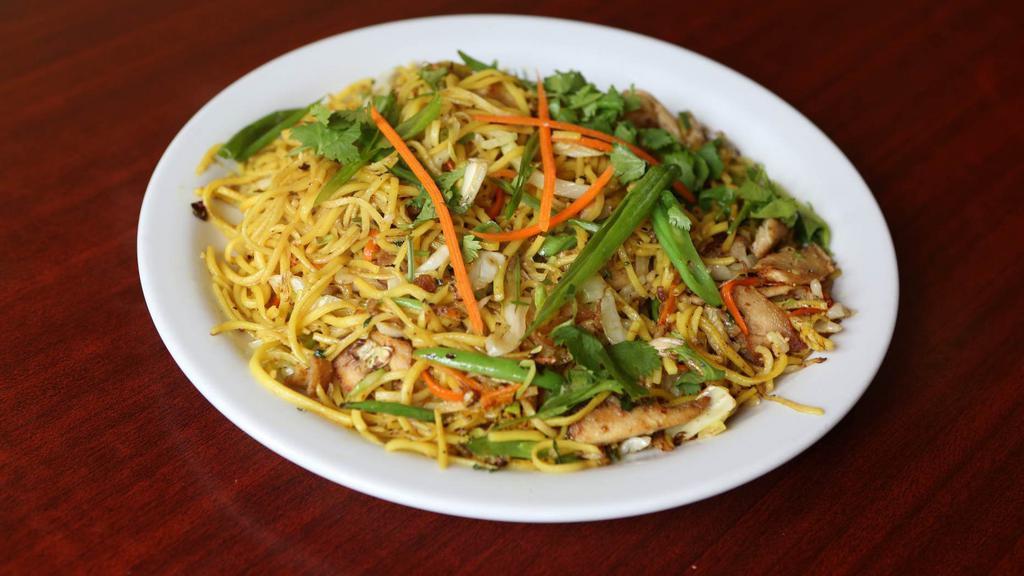 Chicken Chowmein · Stir-fried noodles with diced boneless chicken and vegetables.