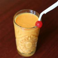 Mango Lassi · Mango-flavored homemade yogurt drink.