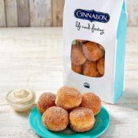 Cinnasweeties® · Bite-size doughnut treats rolled in our famous Cinnamon sugar, for a perfectly poppable treat.