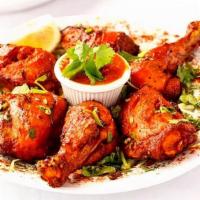 Tandoori Chicken Full · Chicken with bone marinated in lemon, chili, garlic, yogurt, chat masala, and ginger, then r...