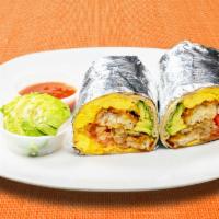 Let's Avocuddle Burrito · Avocado, eggs, tater tots, cheddar cheese, tomatoes and caramelized onions wrapped in a flou...