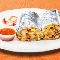 Wham Bam Ham Burrito · Ham, eggs, tater tots, cheddar cheese, tomatoes and caramelized onions wrapped in a flour to...