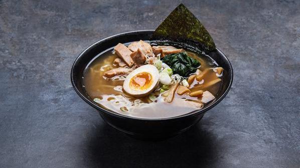 The Shoyu · Clear chicken broth, bamboo shoot, spinach, green onion, seaweed, seasoned egg.  Choice of pork belly, chicken, or tofu.