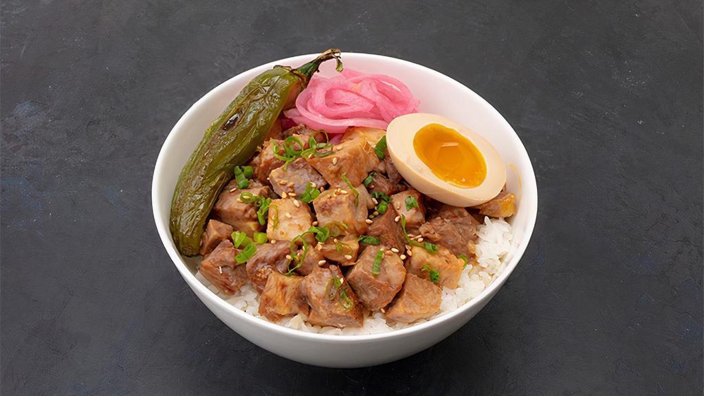 Pork Bowl · Pork belly, pickled onion, green onion, fried jalapeno, soft boiled egg and red ginger over rice.