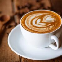 Classic Caffe Latte · Your choice of freshly steamed milk over hand-pulled espresso.