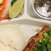 51. Grilled Salmon / Com Cá Salmon · Rice, salmon fish, chili fish sauce or Soybean