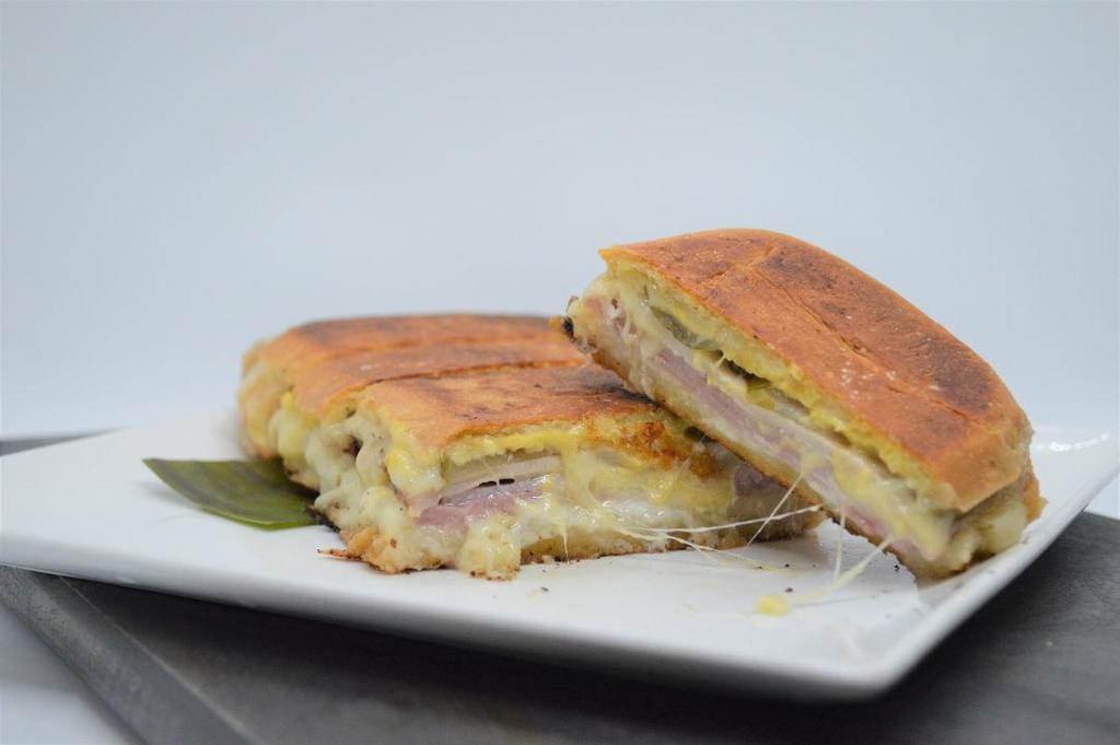 Cuban Sandwich · Ham, Roasted Pork, Pickles, Swiss Cheese, Mustard, Mayo