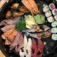 15. Sushi for 2 · Maguro, hamachi, ebi, unagi, sake, tako, tai, and ikura (2 pieces each), tekka maki, kappa m...