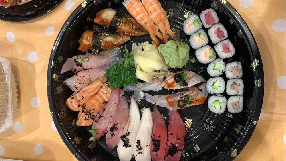 15. Sushi for 2 · Maguro, hamachi, ebi, unagi, sake, tako, tai, and ikura (2 pieces each), tekka maki, kappa maki, hamachi maki, and California maki.