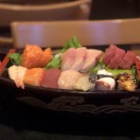 14. The Boat · Salmon tuna and hamachi (three slices each) tekka maki, maguro, hamachi, ebi, unagi, sake, t...