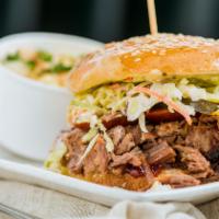 Bubba’s Big as Texas · Eighteen hours chopped brisket, pepper-jack cheese and sliced hotlink, topped with slaw and ...