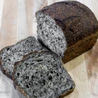 Buckwheat Black Sesame Bread · Mild sourdough loaf with buckwheat flour and toasted black sesame seeds.