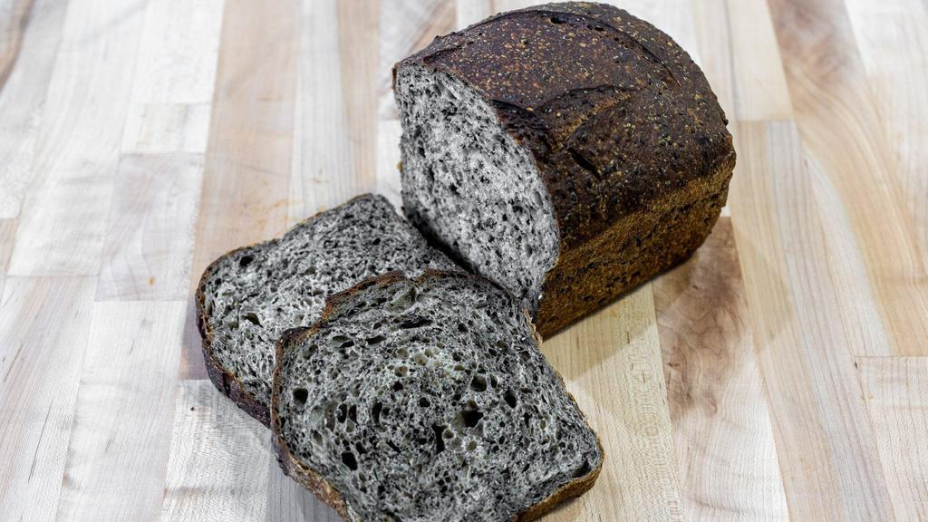 Buckwheat Black Sesame Bread · Mild sourdough loaf with buckwheat flour and toasted black sesame seeds.