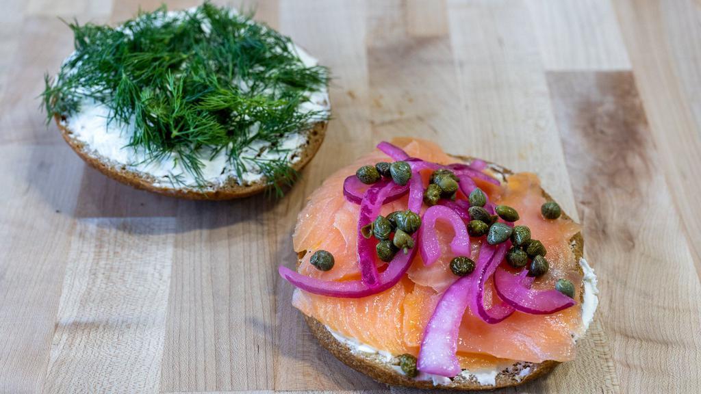 Smoked Salmon Sandwich · Samaki double-cured  smoked salmon, pickled onions, capers, cream cheese, and dill