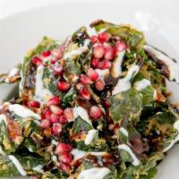 Palak Chaat · Fresh spinach, chickpea batter fried, served with mint and tamarind chutney.