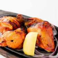 Tandoori Chicken · Half chicken on the bone, classic tandoori masala, and kasoori methi.