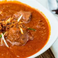 Rajasthani Laal Mass · Gluten-free. Superior farms lamb stew, quinate chili, onions, and house spice mix.