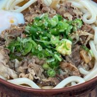 Nikutama (Niku with Egg)  Udon · Top Seller. Soy braised sliced beef, sweet onions, green onions, ginger and toasted sesame s...