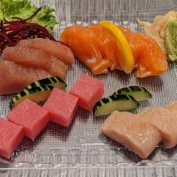 Moriawase Sashimi · Chef's choice of combination sashimi. Fresh raw fish sliced into thin pieces. Total is 14 pc...