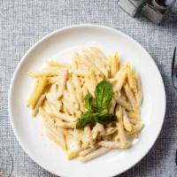 I ain't no Alfredo! · Creamy white sauce cooked in the pasta of your choice. Garnished with basil.