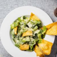 Julius Caesar Salad · Refreshing green salad with a mix of romaine lettuce, croutons dressed with lemon juice, oli...