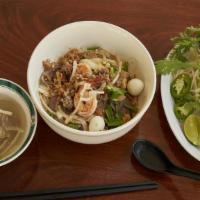 29. Dry Noodle / Hu Tieu Nam Vang (Kho) · Shrimp, squid, slice pork, pork cake, heart, ground pork and quail egg with rice noodle. (Dr...