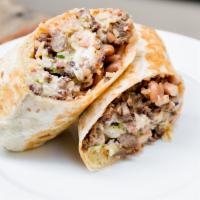 Super Burrito · Flour tortilla with rice, whole beans, cheese, sour cream, pico de gallo, guacamole, salsa a...